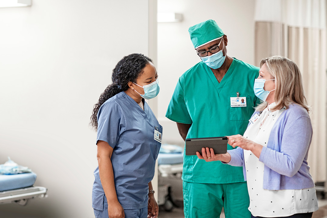Nurse using digital tablet