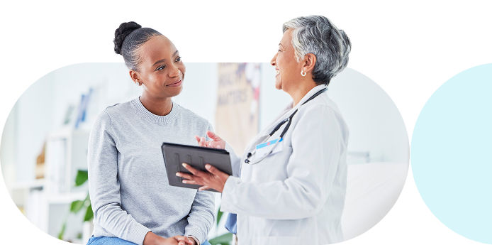 Provider and patient discussing healthcare information during a consultation. 